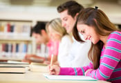 Group of students taking a test at the university-1